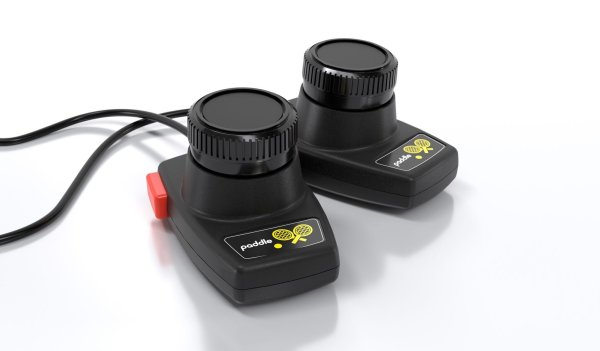 Mit Drehrad, etwa für Sportspiele: Als Zubehör ist der Paddle-Controller CX30+ im Zweierpack erhältlich (35 Euro). - © Atari/dpa-tmn