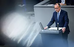 CDU-Chef Merz geht im Finanzstreit auf die Grünen zu. - © Bernd von Jutrczenka/dpa