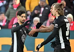 Mohammed Amoura (l.) freut sich &uuml;ber sein Tor zum 1:0 in Mainz. - &copy; Torsten Silz/dpa