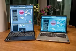 Sieht komisch aus, ist aber praktisch: Der ausgefahrene Bildschirm des Thinkbooks im Vergleich zu einem normalen 14-Zoll-Notebook. - &copy; Nico Tapia/dpa-tmn