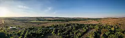 Die berühmten Sterkfontein Caves liegen in der hügeligen Landschaft der Provinz Gauteng. - © Brett Eloff/Wits University/dpa-tmn