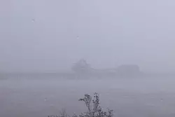 Schon bevor der Zyklon auf Land traf, gab es vielerorts Starkregen. - © Uncredited/TRACEY HEIMBERGER/AAP/dpa