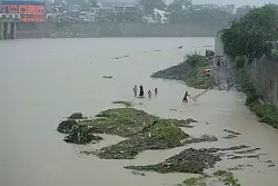 Fl&uuml;sse sind in der Folge des Sturms massiv angeschwollen. - &copy; Aaron Favila/AP/dpa