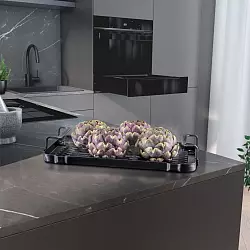 Platzsparend ist eine Dampfschublade, die sich etwa unter dem Backofen einfügen lässt. - © AMK/dpa-tmn