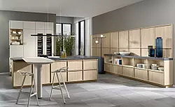 Schrankfront mit filigranem Rahmen: Der Japandi-Stil zeichnet sich durch Minimalismus, sanfte Farben und natürliche Materialien aus. - © Pronorm Einbauküchen/dpa-tmn