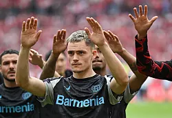 Allen voran Ausnahmespieler Florian Wirtz hinterlässt durch seinen Wechsel zum FC Liverpool eine Lücke beim Vizemeister. - © Arne Dedert/dpa