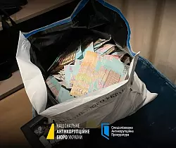 Bei Schmiergeldzahlungen werden in der Ukraine nach Erkenntnissen von Korruptionsj&auml;gern Taschen voll mit Bargeld &uuml;bergeben. - &copy; -/Nationales Antikorruptionsb&uuml;ro der Ukraine/Spezialisierte Antikorruptionsstaatsanwaltschaft der Ukraine/dpa