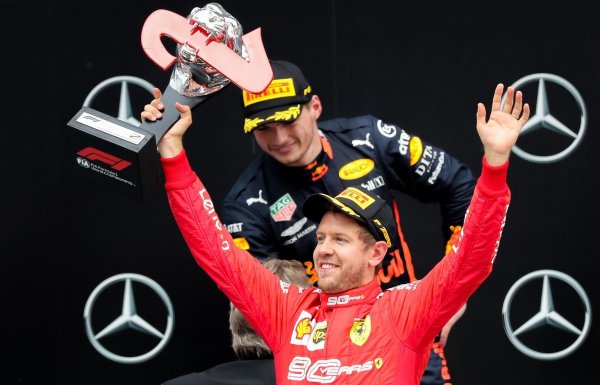 Vettel und Verstappen - © Foto: Jan Woitas/dpa-Zentralbild/dpa