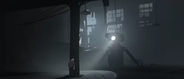 Ein Junge versteckt sich vor einem mächtigen Scheinwerfer in der unheimlichen Welt von „Inside“. - © Playdead
