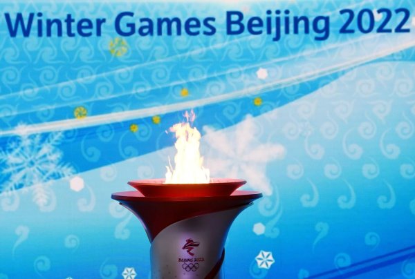 Olympisches Feuer - © Foto: Zhang Chenlin/XinHua/dpa