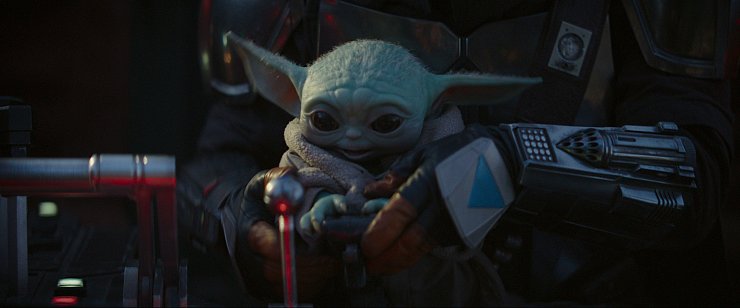 "Das Kind" wird im Internet auch gerne "Baby Yoda" genannt. Das Wesen gehört zur gleichen Art wie der berühmte Yedi-Meister Yoda. Das Kind begleitet Mando ab dem Ende der ersten Folge in "The Mandalorian", exklusiv auf Disney+. - © Lucasfilm Ltd.
