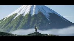 Eine Szene im Breitbandformat aus „Ghost of Yotei“: Protagonistin Atsu auf ihrem Pferd vor der majestätischen Kulisse des Berges Yotei. - © Sony Interactive Entertainment