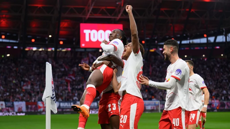 Yan Diomande (l-r), Castello Lukeba, Assan Ou&eacute;draogo und Romulo jubeln nach dem 1:0. - &copy; Hendrik Schmidt/dpa