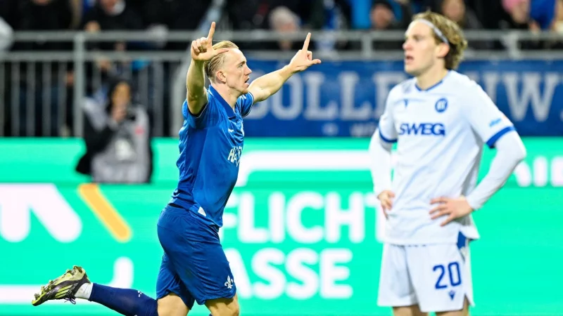 Darmstadts Isac Lidberg jubelt über sein Tor zum zwischenzeitlichen 2:1 gegen Karlsruhe. - © Uwe Anspach/dpa