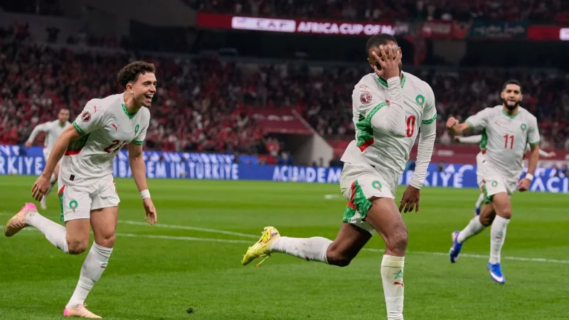 Marokkos Ayoub El Kaabi bejubelt die F&uuml;hrung gegen Sambia. - &copy; Themba Hadebe/AP/dpa