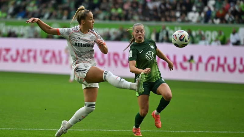 Energisch: Bayern-Star Giulia Gwinn (l). - © Swen Pförtner/dpa