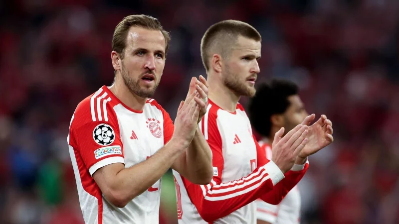 Harry Kane (l) und Eric Dier (r), der die Bayern am Saisonende verlässt. Die beiden Engländer sehnen sich nach dem ersten Titelgewinn in ihrer Profi-Karriere. - © Matthias Balk/dpa