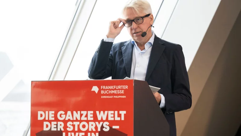 Buchmessen-Direktor Juergen Boos freut sich auf die 77. Ausgabe. - &copy; Boris Roessler/dpa