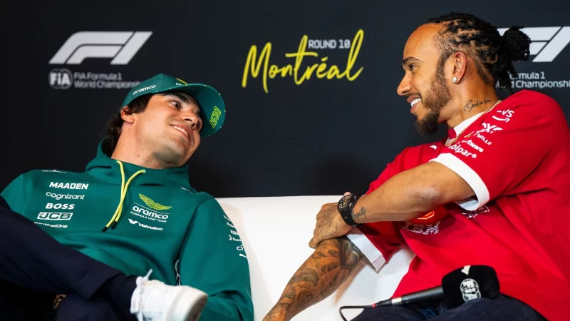 Hamilton (rechts) bei einer Medienrunde im Gespräch mit Lance Stroll. - © Christopher Katsarov/The Canadian Press/AP/dpa