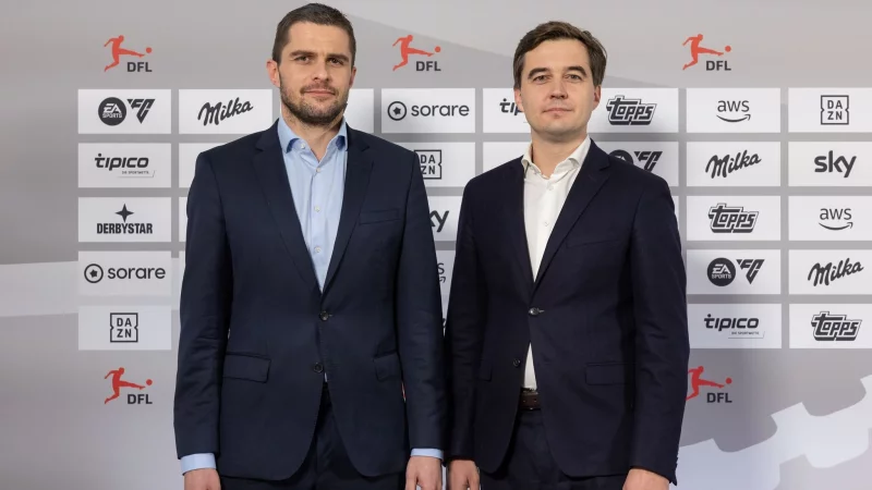 Marc Lenz und Steffen Merkel stehen bis Ende 2029 weiter an der Spitze der Deutschen Fußball Liga. - © Jürgen Kessler/dpa