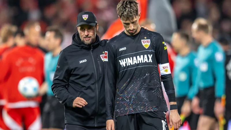 Sebastian Hoene&szlig; und sein Kapit&auml;n Atakan Karazor - &copy; Andreas Gora/dpa