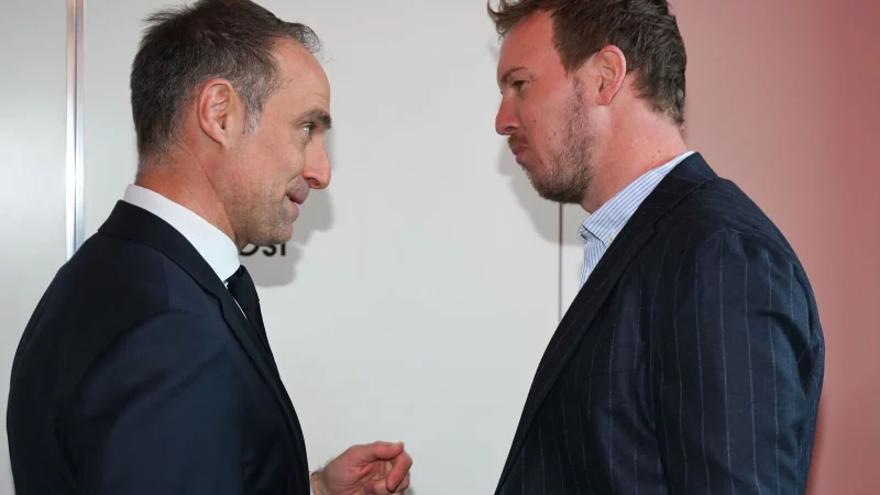 Oliver Mintzlaff (l) hat &uuml;ber den Umgang mit der deutschen Nationalmannschaft und Julian Nagelsmann (r) gesprochen. - &copy; Arne Dedert/dpa