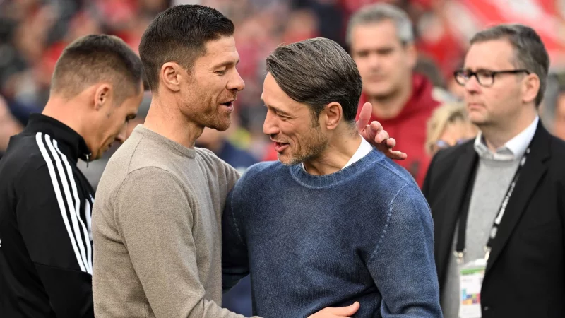 Niko Kovac (r) weiß genau, was ihn mit dem BVB gegen Real Madrid erwartet. - © Federico Gambarini/dpa