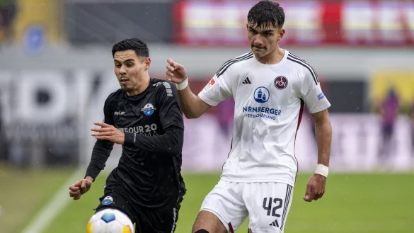 Hoffnungstr&auml;ger unter sich: SCP-Leistungstr&auml;ger Raphael Obermair wird wieder auf der Sechs spielen. N&uuml;rnberg hofft derweil auf Tore von Can Uzun (r.). - &copy; picture alliance/dpa