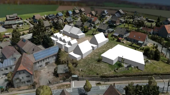 Dieser Entwurf des B&uuml;ros Alberts Architekten zeigt eine M&ouml;glichkeit, das Areal an der Ecke B 66/Hellweg zu gestalten. Zur Stra&szlig;e hin (rechts) ist ein Multifunktionsgeb&auml;ude zu sehen. Auf dem Areal finden sich dann an einer Seite Einfamilienh&auml;user sowie Mehrfamilienh&auml;user, die den Charakter von Einfamilienh&auml;usern haben und die kleinere Wohnungen bieten, sowie "Minimalh&auml;user" f&uuml;r "Starter-Haushalte". - &copy; Gemeinde D&ouml;rentrup