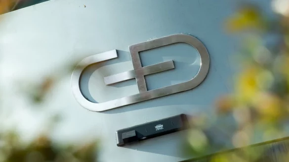 Das Firmenlogo an der Zentrale von Giesecke + Devrient in M&uuml;nchen. - &copy; Alexander Heinl/dpa