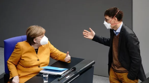 Merkel und Lauterbach - &copy; Foto: Kay Nietfeld/dpa