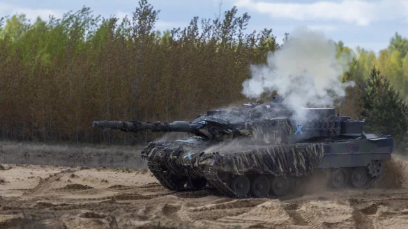 Ein deutscher Panzer bei einer Nato-Übung in Litauen: Dem Land könnte eine strategische Bedeutung im Konflikt mit Russland zukommen. - © Mindaugas Kulbis/AP/dpa