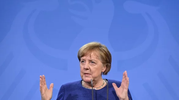 Merkel - &copy; Foto: John Macdougall/AFP Pool/dpa