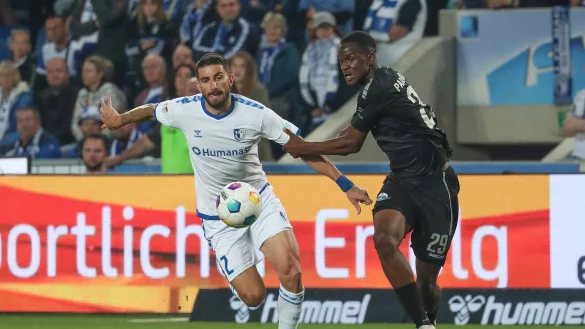 Bei seinem Zweitligadeb&uuml;t in Magdeburg bekam es Ilyas Ansah (r.) am 22. September 2023 gleich mit dem italienischen Ex-Nationalspieler Cristiano Piccini zu tun. - &copy; Imago Images