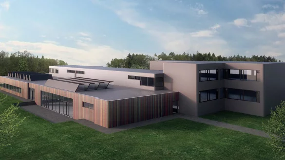 Eine Ansicht von S&uuml;dosten: So soll die ehemalige Hauptschule nach dem Umbau aussehen. Die Fassade wird mit gr&uuml;nen, gelben und roten Streifen gestaltet. Die Farben finden sich im Inneren des Geb&auml;udes wieder und markieren Schulbereich und B&uuml;rgerforum. Grafik: Schmersahl/Biermann/Pr&uuml;&szlig;ner Architekten - &copy; Schmersahl/Biermann/Pr&uuml;&szlig;ner Architekten